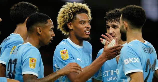 Floyd Samba celebrating a goal on his Manchester City debut