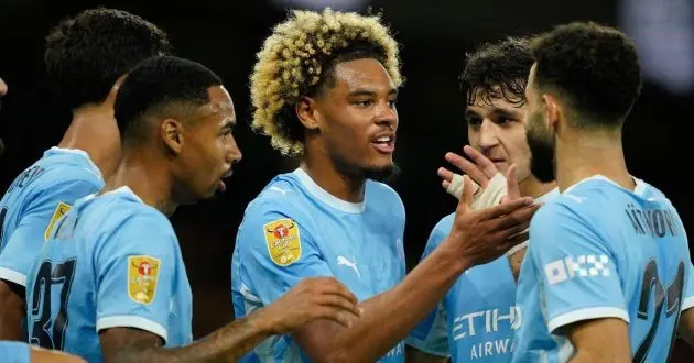 Floyd Samba celebrating a goal on his Manchester City debut